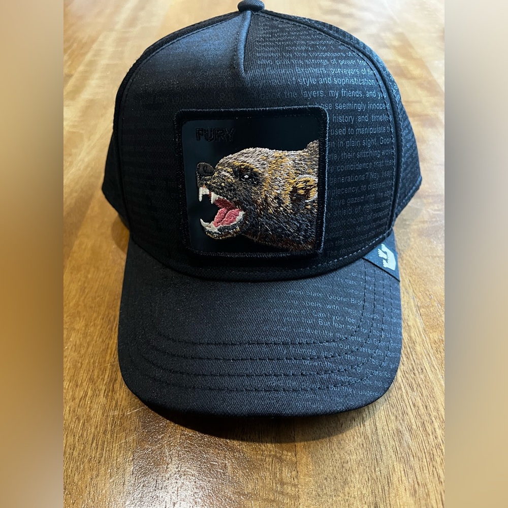 Black Fury Cap with Animal Patch